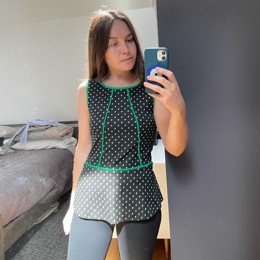 Old Anthro polka dot peplum top with green piping Size: XS